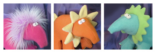 three plush dinosaurs