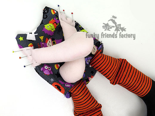 pin arms to front