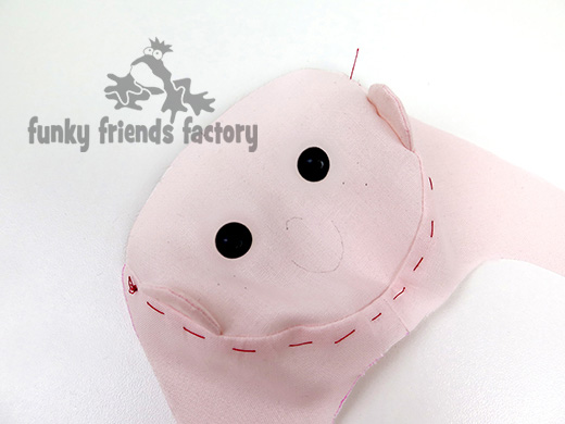 Baste or tack the seam away from the face