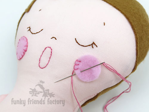 sew-doll-cheeks-from-felt