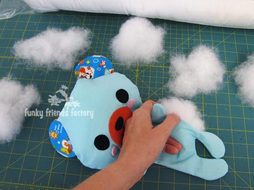 Use small bits of toy stuffing